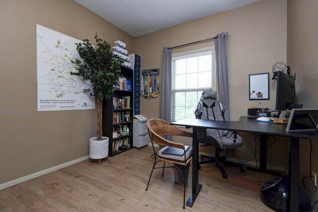 1376 N 14th St, Ozark, MO 65721 - home office featuring baseboards and wood finished floors