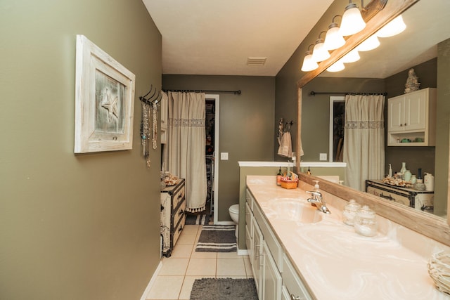 full bathroom with visible vents, tile patterned flooring, vanity, toilet, and baseboards