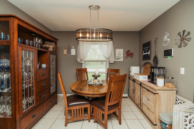 dining space with light tile patterned floors