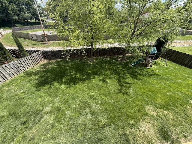 view of yard with a fenced backyard