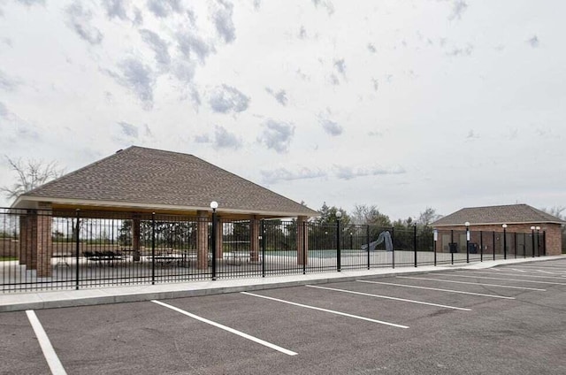 uncovered parking lot with fence