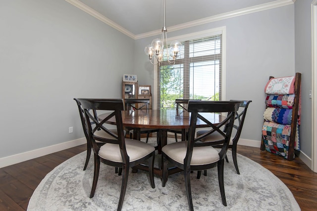 dining room with baseboards, a notable chandelier, ornamental molding, and wood finished floors