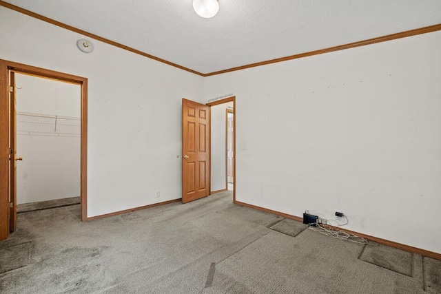 26929 Cordwood Ridge Dr, Shell Knob, MO 65747 - unfurnished room featuring crown molding, baseboards, and carpet flooring