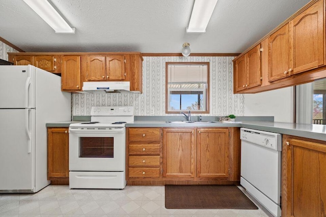 26929 Cordwood Ridge Dr, Shell Knob, MO 65747 - kitchen featuring white appliances, wallpapered walls, under cabinet range hood, brown cabinets, and a sink