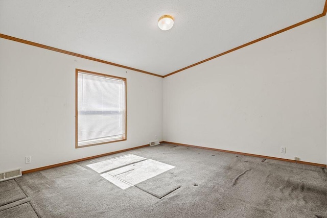 26929 Cordwood Ridge Dr, Shell Knob, MO 65747 - carpeted spare room with baseboards, visible vents, and ornamental molding