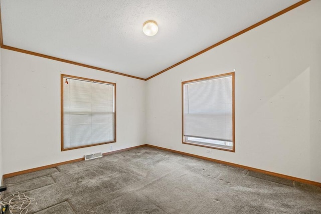 26929 Cordwood Ridge Dr, Shell Knob, MO 65747 - spare room featuring carpet, visible vents, ornamental molding, and lofted ceiling