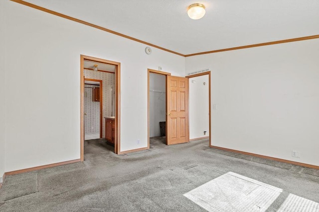 26929 Cordwood Ridge Dr, Shell Knob, MO 65747 - unfurnished bedroom featuring a closet, ornamental molding, light carpet, baseboards, and ensuite bath