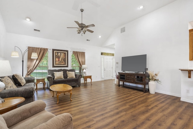 living area with visible vents, a ceiling fan, and dark wood-style flooring