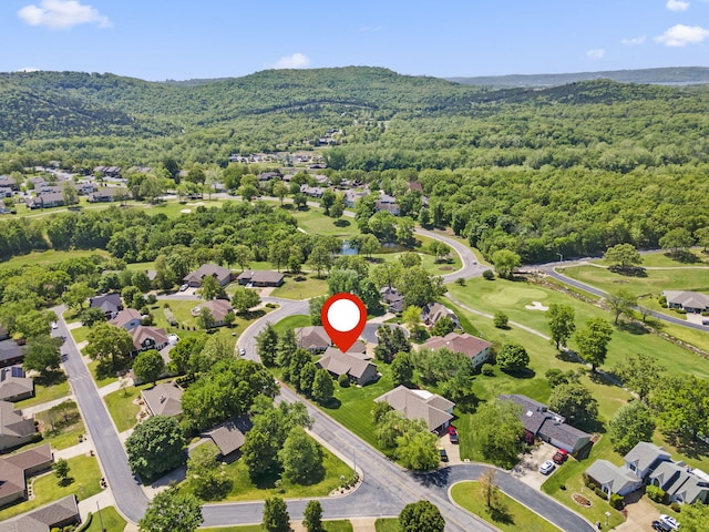 aerial view featuring a mountain view, a residential view, and a forest view
