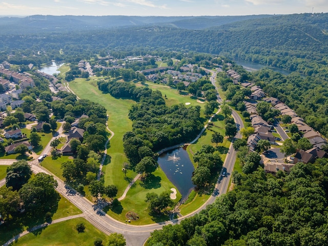 aerial view featuring a water and mountain view