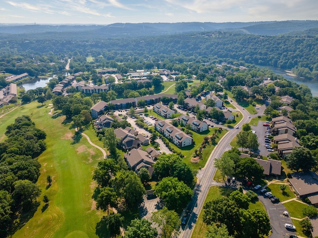 aerial view with a water and mountain view, golf course view, and a residential view