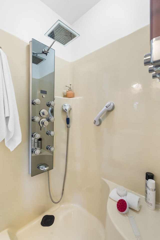 bathroom featuring visible vents and a shower