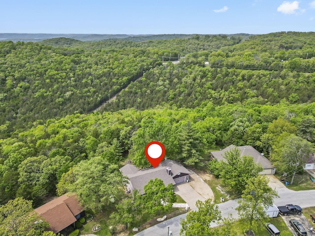 bird's eye view featuring a forest view