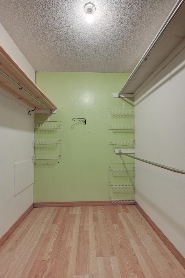 3623 Ridge Dr, Joplin, MO 64801 - walk in closet with light wood-type flooring