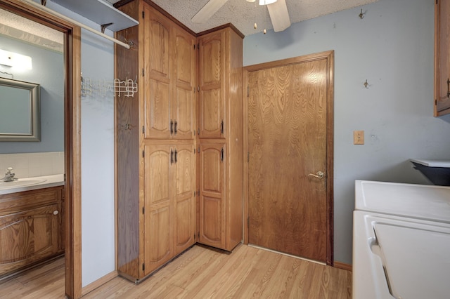 3623 Ridge Dr, Joplin, MO 64801 - bathroom featuring a ceiling fan, a textured ceiling, wood finished floors, and vanity
