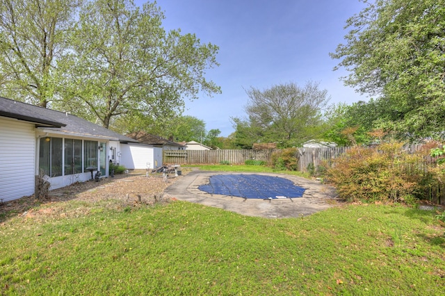 3623 Ridge Dr, Joplin, MO 64801 - view of pool featuring a lawn, a fenced backyard, a sunroom, and a patio