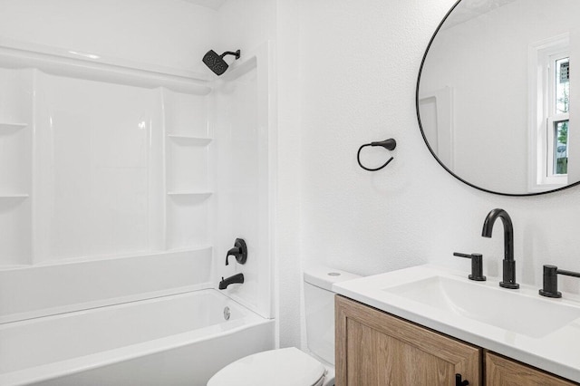 full bath with vanity, shower / bathing tub combination, and toilet