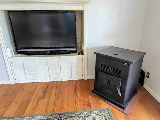 details with baseboards and wood finished floors