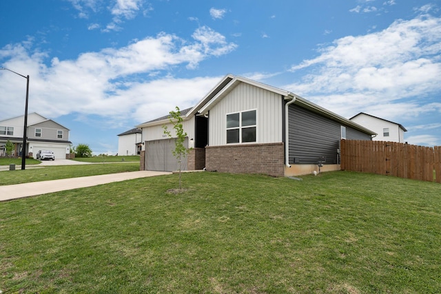 view of front facade with board and batten siding, brick siding, fence, concrete driveway, and an attached garage
