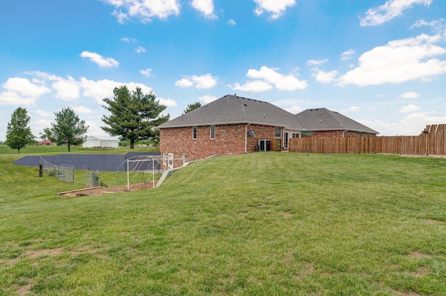 view of yard with fence