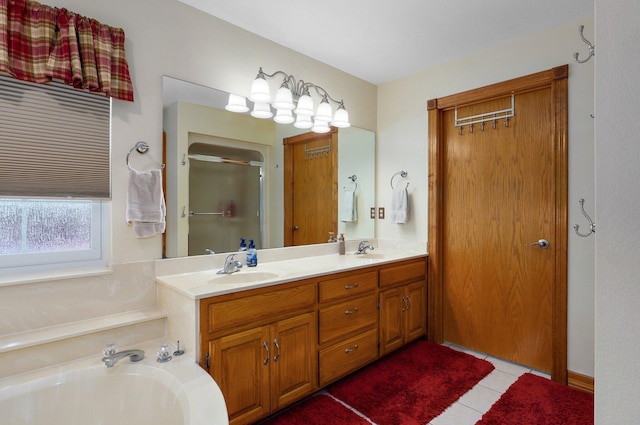 bathroom with a sink, tile patterned flooring, a shower stall, and a garden tub