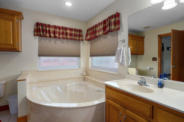 full bathroom with recessed lighting, toilet, visible vents, a bath, and vanity
