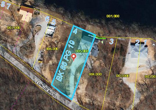 aerial overview of property's location featuring property boundaries highlighted