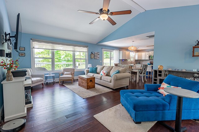 living area with a ceiling fan and hardwood / wood-style floors