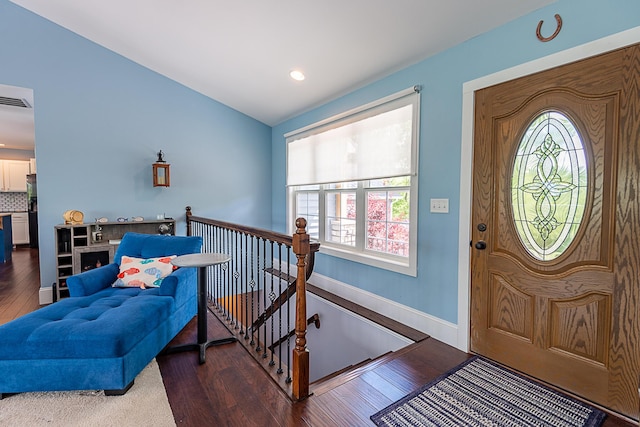 entrance foyer featuring wood finished floors, baseboards, and recessed lighting