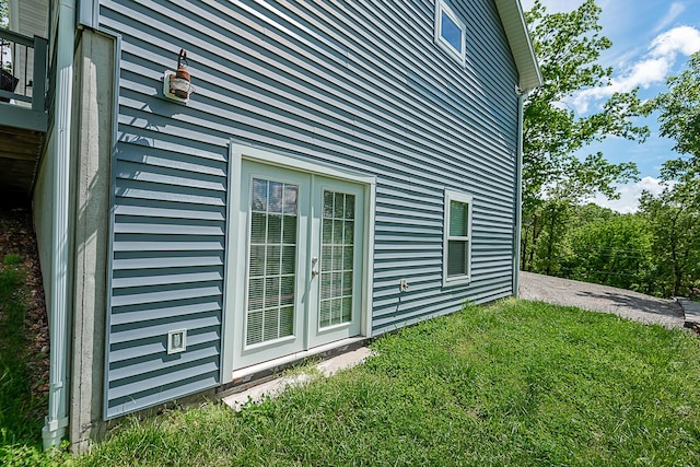 view of home's exterior featuring a yard