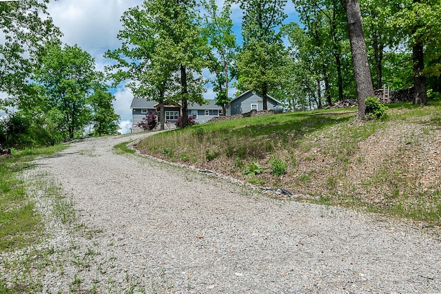 view of front of house with gravel driveway