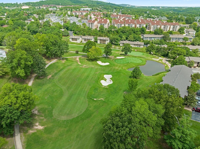 aerial view featuring a water view and golf course view