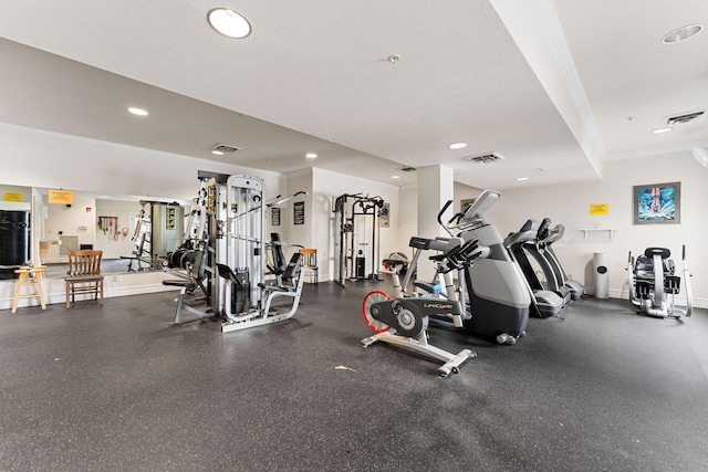 workout area with baseboards, recessed lighting, ornamental molding, and visible vents
