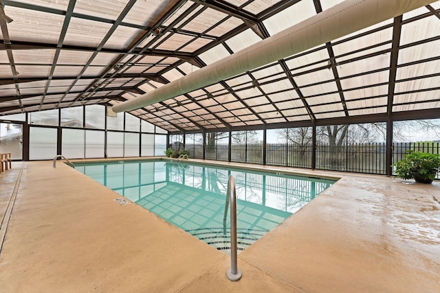 community pool featuring a patio area and fence