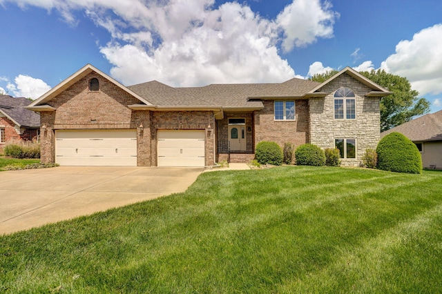 view of front facade featuring a front yard, brick siding, concrete driveway, an attached garage, and a shingled roof