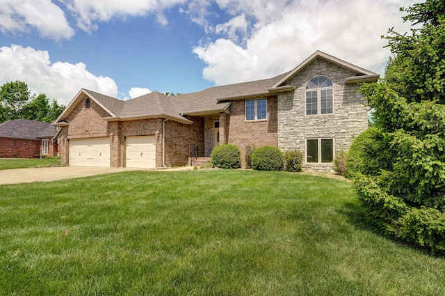 split level home with concrete driveway, a front lawn, roof with shingles, and a garage