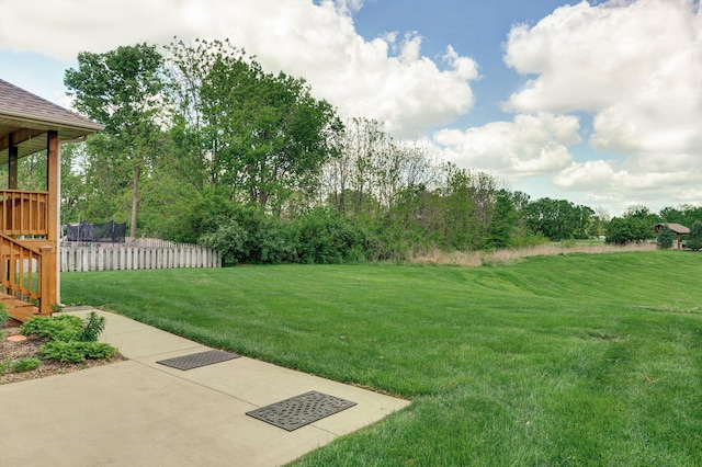 view of yard with fence