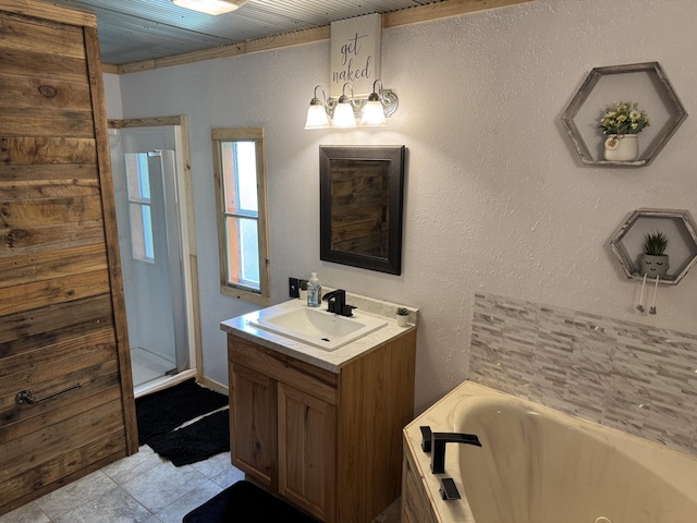 full bathroom featuring a garden tub, tile patterned floors, wooden ceiling, and vanity