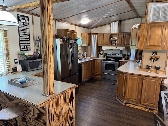 kitchen with open shelves, light countertops, under cabinet range hood, appliances with stainless steel finishes, and vaulted ceiling