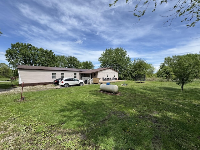 view of yard with a trampoline