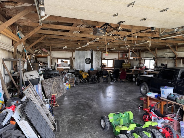 garage featuring a garage door opener