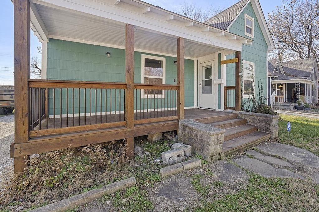 722 W Brower St, Springfield, MO 65802 - wooden terrace featuring covered porch