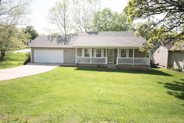single story home featuring covered porch, a garage, concrete driveway, a shingled roof, and a front yard
