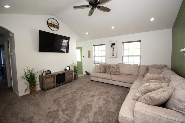 carpeted living room with lofted ceiling, recessed lighting, baseboards, ceiling fan, and arched walkways