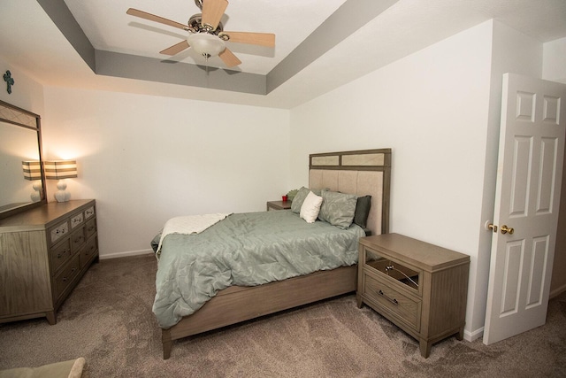 bedroom with carpet, baseboards, and a ceiling fan