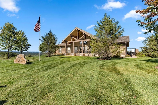 190 Windy Ridge Dr, Hollister, MO 65672 - back of property featuring a porch and a lawn