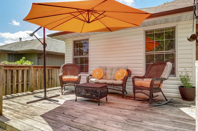 deck featuring outdoor lounge area
