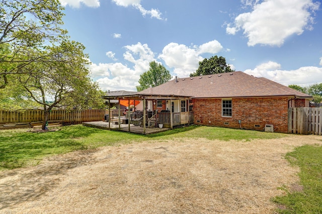 back of house featuring a fenced backyard, a wooden deck, a yard, and crawl space