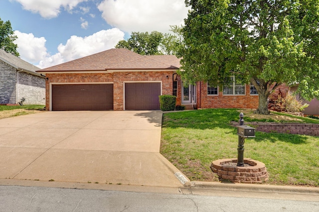single story home with an attached garage, brick siding, driveway, and a front lawn