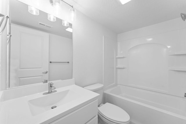 403 Veterans Blvd Unit 203 G6, Branson, MO 65616 - bathroom featuring vanity, toilet, tub / shower combination, and visible vents